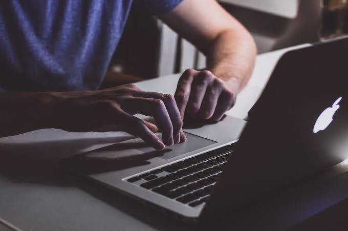Writing on a laptop